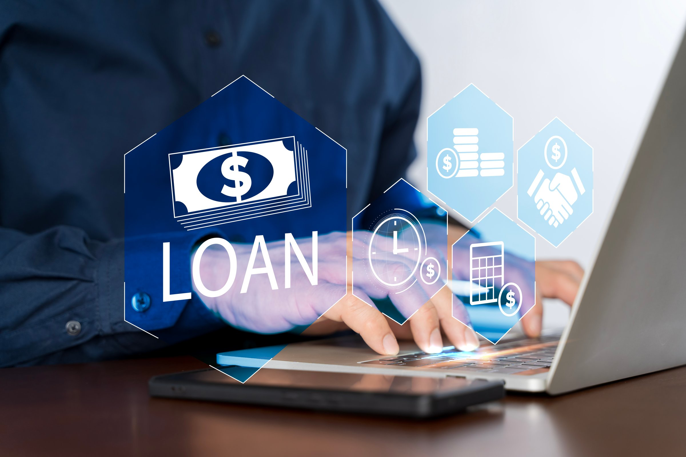 Online personal loan and financial concept. Financial loan agreement, Personal or business loans through online services between lenders and borrowers. Person using laptop laptop with loan icon.